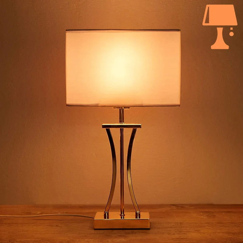 lampe de chevet dorée blanc table